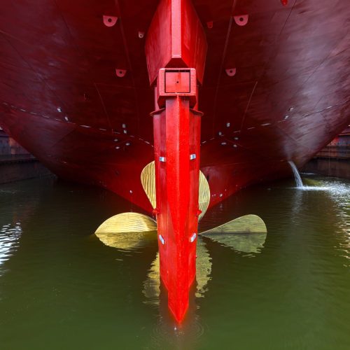 Close up of a Ship Propeller in water.